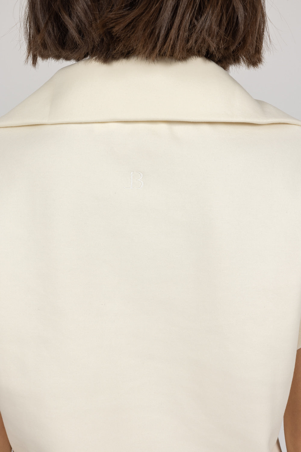 ALIX top in beige back look close up