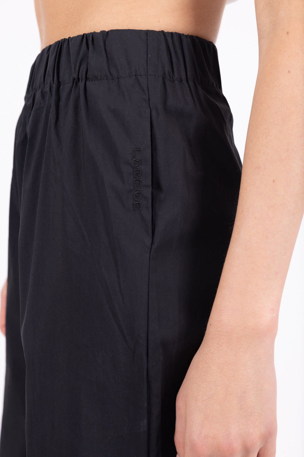 HAILEY pants front close up logo look